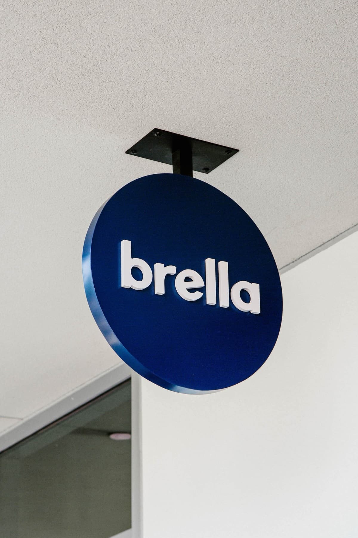 Brella environmental graphics — playful characters painted at a child's eye level